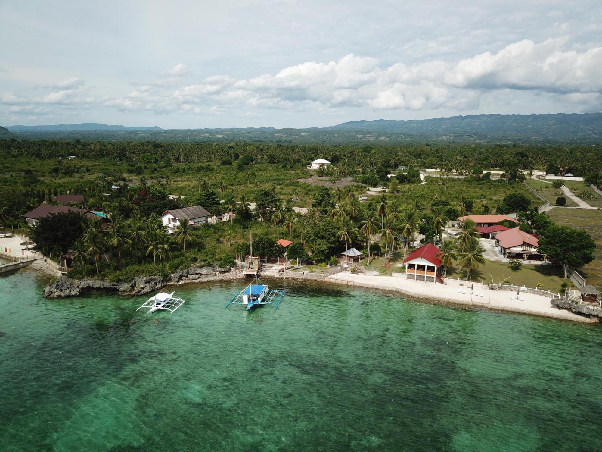 Tauig Beach Resort Моалбоал Экстерьер фото