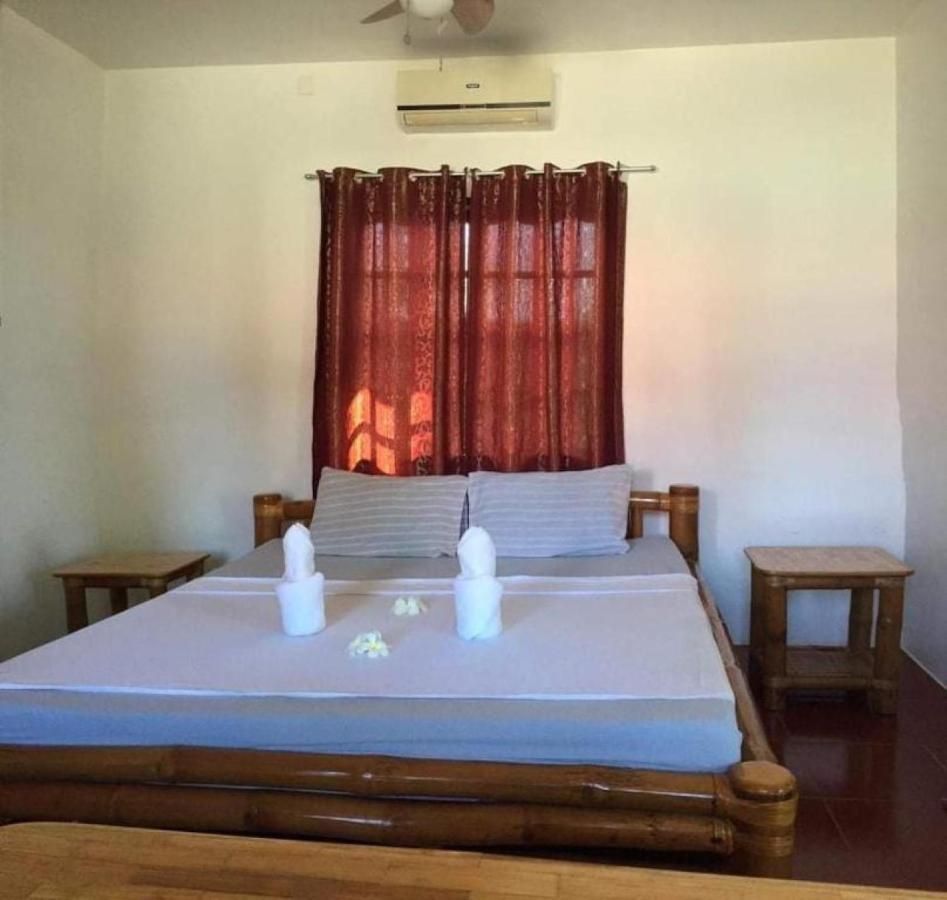 Tauig Beach Resort Моалбоал Экстерьер фото